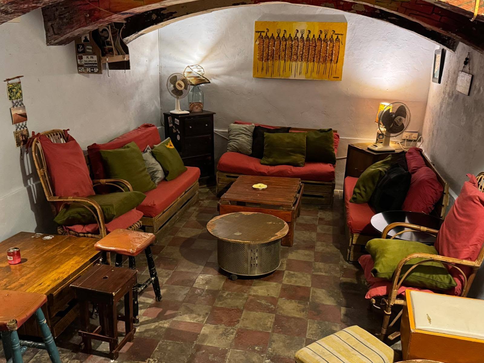 Cosy seating and art at Ġugar